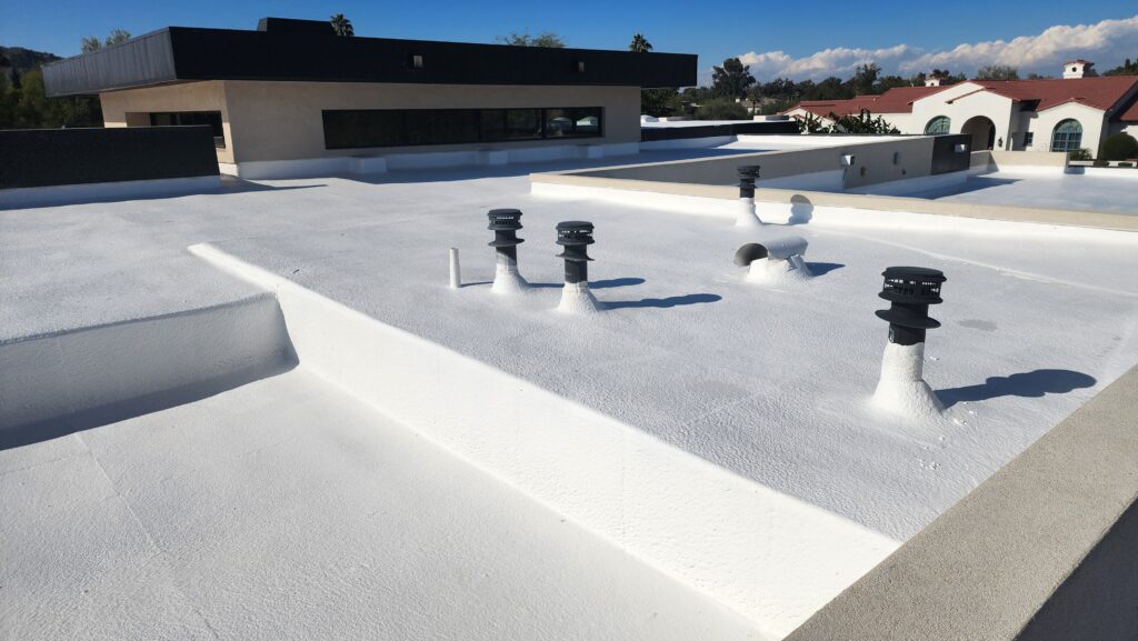 new foam flat roof installation on residential home in Phoenix Arizona