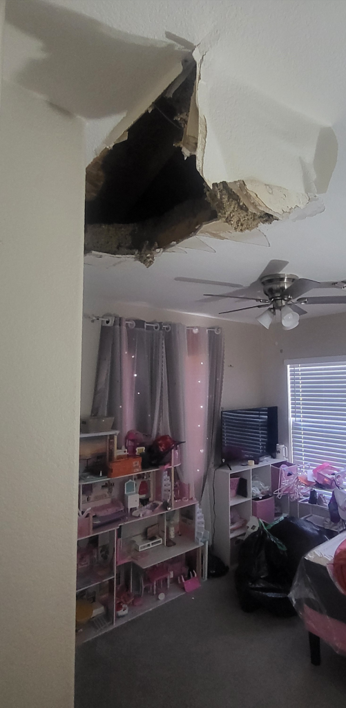 emergency roof repair in Phoenix Arizona showing active roof leak damage