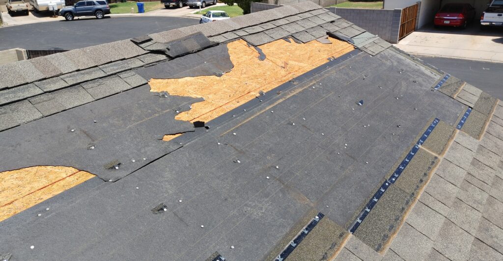 emergency roof damage in Phoenix caused by storm or broken roof tile