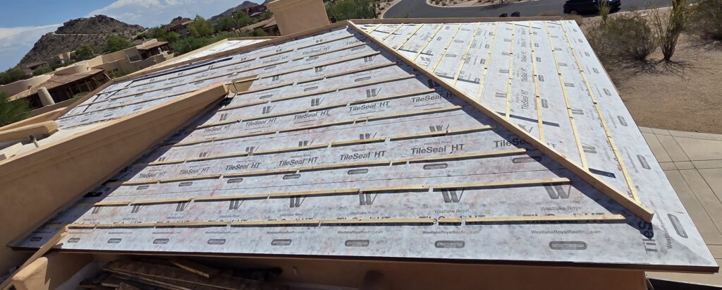 new tile roof underlayment installation on Phoenix Arizona home before tile reinstallation
