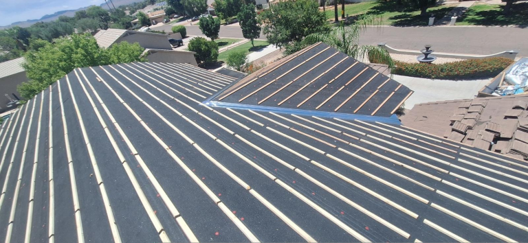 tile roof underlayment exposed during tile roof repair in Phoenix Arizona